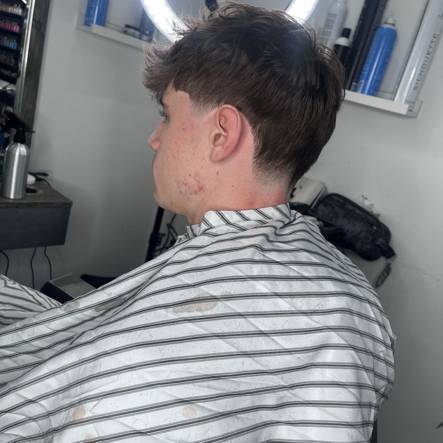 Sharp men's skin fade haircut at RYAN STYLES